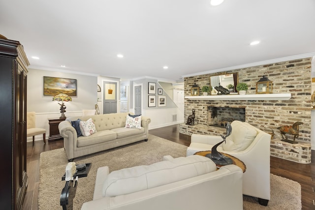 4940 Lambs Rd, North Charleston, SC 29418 - living area with ornamental molding, dark wood finished floors, recessed lighting, and a brick fireplace
