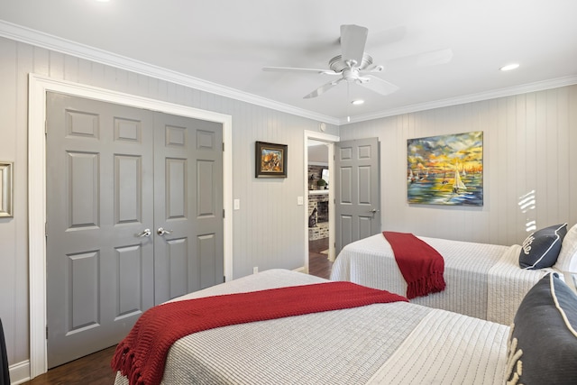 4940 Lambs Rd, North Charleston, SC 29418 - bedroom featuring dark wood-style flooring, ornamental molding, a closet, ceiling fan, and recessed lighting