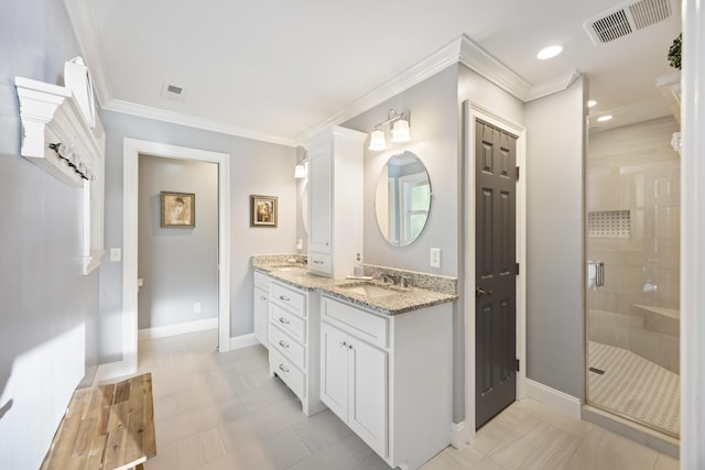 4940 Lambs Rd, North Charleston, SC 29418 - bathroom featuring double vanity, a shower stall, ornamental molding, and recessed lighting