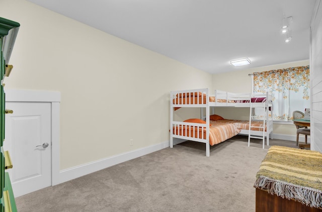 bedroom featuring carpet