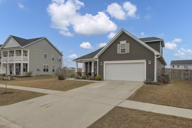 view of front of home featuring a garage, a front yard, and central air condition unit