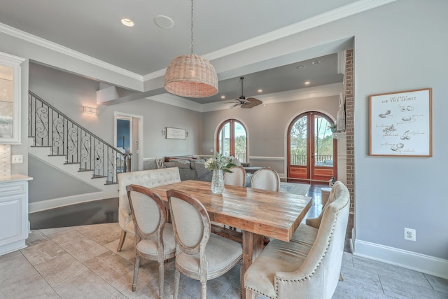 dining area featuring stairs, french doors, ornamental molding, and baseboards