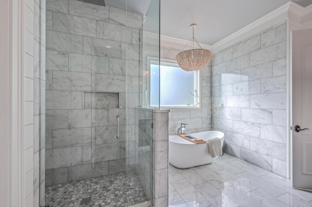 bathroom with a freestanding bath, ornamental molding, a stall shower, and tile walls