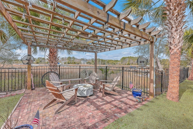 view of patio / terrace with a fenced backyard and a pergola