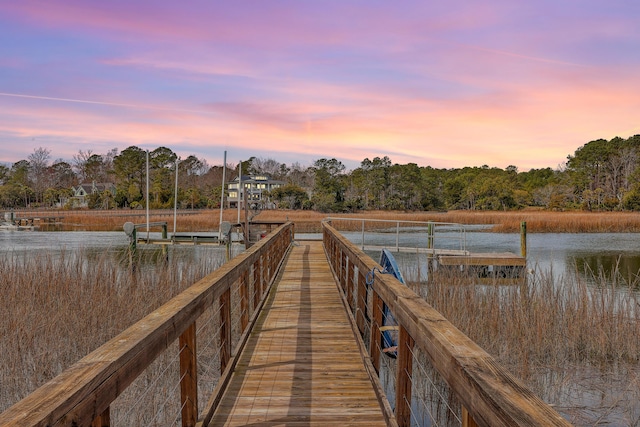 view of dock featuring a water view and boat lift