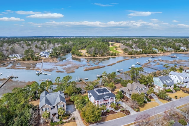 bird's eye view with a water view and a residential view