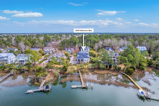 bird's eye view featuring a residential view and a water view