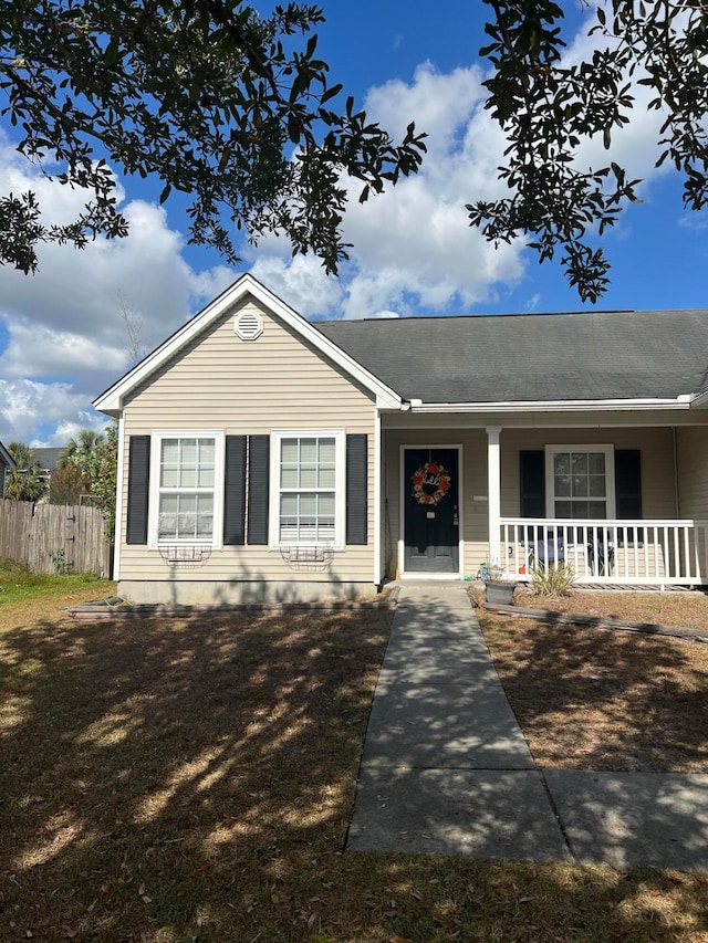 ranch-style house featuring covered porch