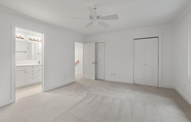321 Lapwing Ln, Mount Pleasant, SC 29464 - unfurnished bedroom featuring two closets, crown molding, light colored carpet, ensuite bath, and ceiling fan