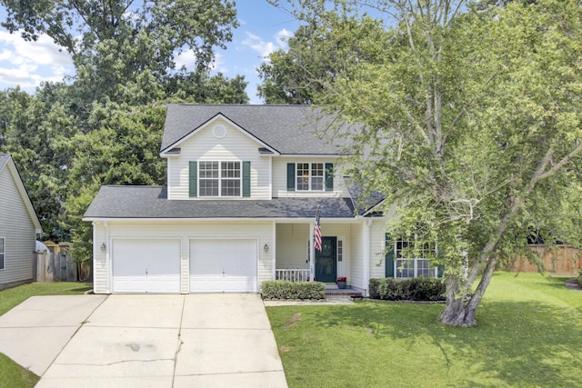 103 Trimley Ct, Goose Creek, SC 29445 - traditional-style home with covered porch, driveway, a garage, and a shingled roof
