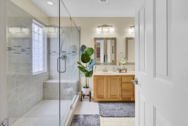 103 Trimley Ct, Goose Creek, SC 29445 - full bathroom featuring a stall shower, tile patterned floors, and vanity