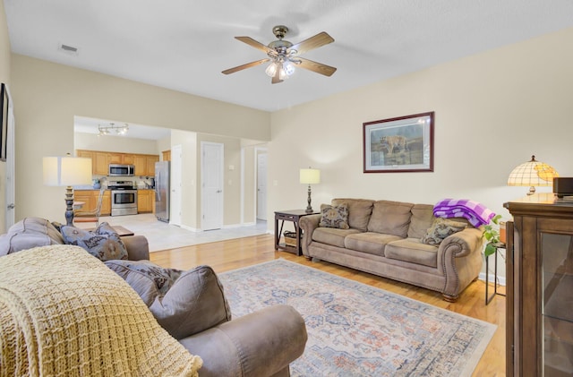 103 Trimley Ct, Goose Creek, SC 29445 - living room with ceiling fan and light wood-type flooring