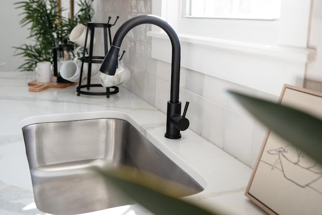 details with tasteful backsplash and sink