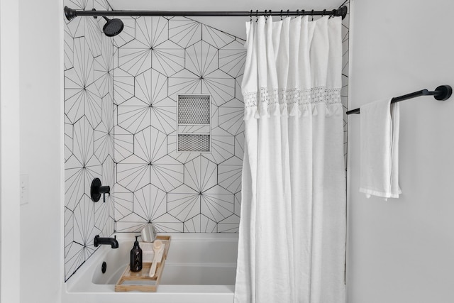 bathroom with shower / bath combination with curtain