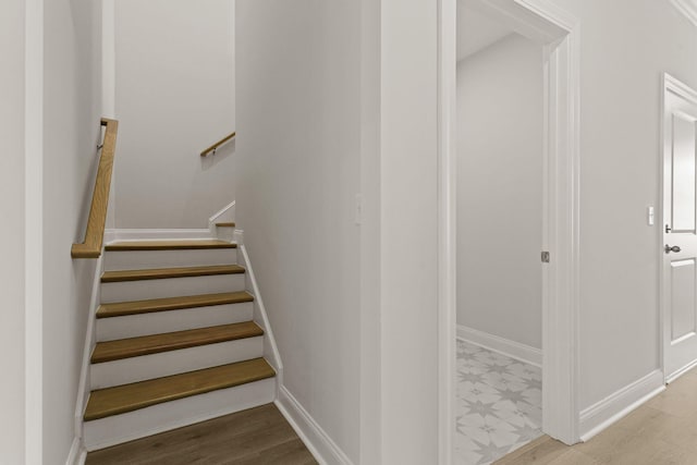 stairway with baseboards