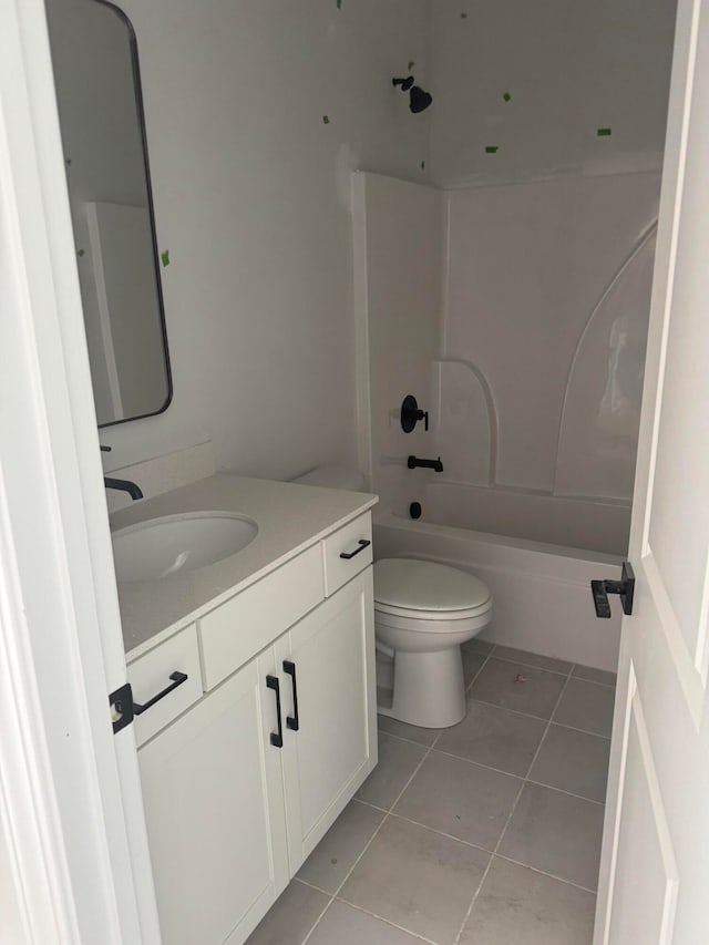 bathroom with toilet, tile patterned floors, shower / bathing tub combination, and vanity