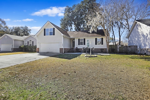 view of front of home featuring a garage and a front lawn