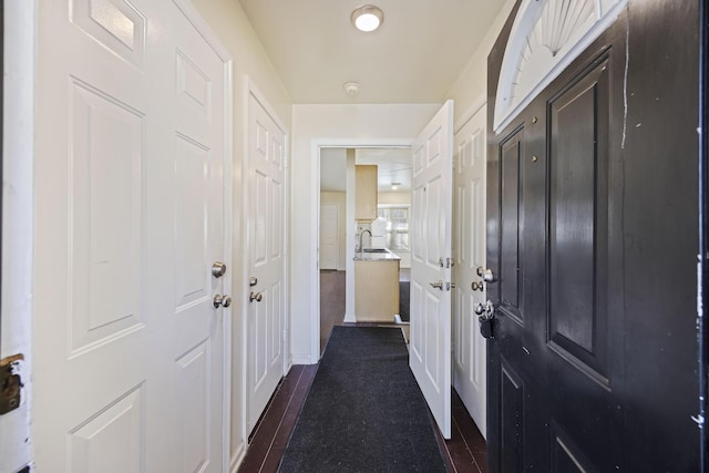 hallway featuring sink