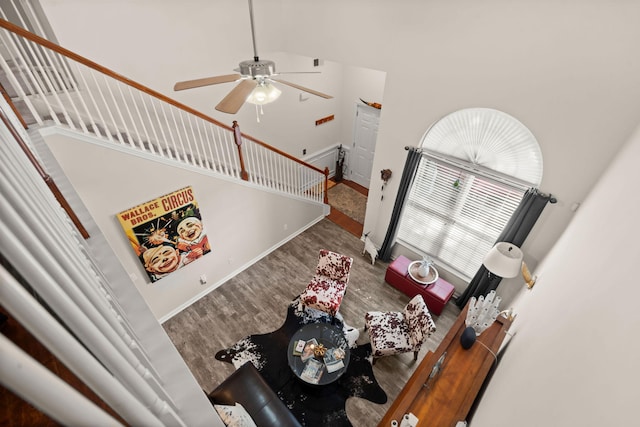 3364 Middlesboro Ave, Summerville, SC 29485 - living area with wood finished floors, a ceiling fan, high vaulted ceiling, baseboards, and stairs
