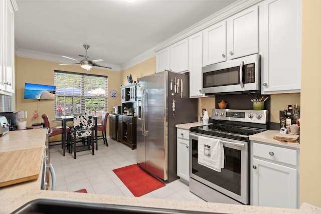3364 Middlesboro Ave, Summerville, SC 29485 - kitchen featuring appliances with stainless steel finishes, light countertops, white cabinetry, crown molding, and ceiling fan