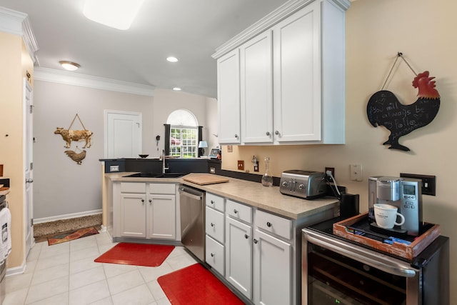 3364 Middlesboro Ave, Summerville, SC 29485 - kitchen with a sink, stainless steel dishwasher, ornamental molding, a peninsula, and beverage cooler
