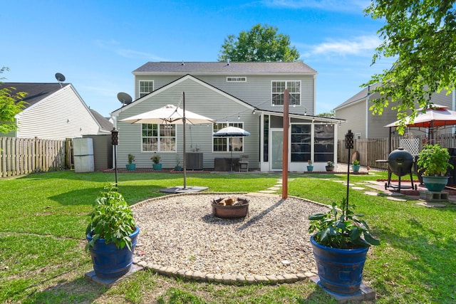 3364 Middlesboro Ave, Summerville, SC 29485 - rear view of house with a fire pit, a sunroom, and a patio area