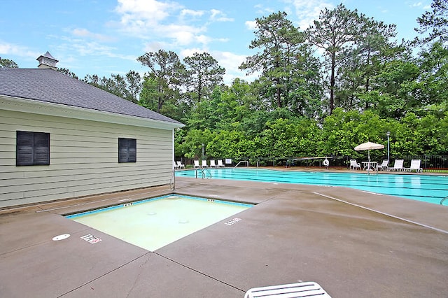 3364 Middlesboro Ave, Summerville, SC 29485 - community pool featuring a patio and view of wooded area