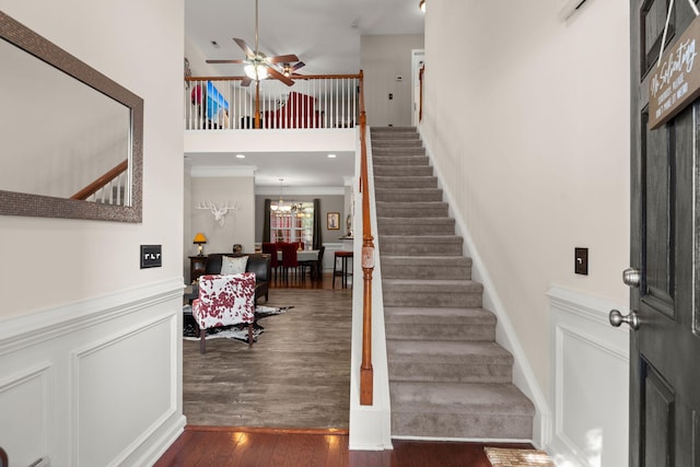 3364 Middlesboro Ave, Summerville, SC 29485 - entrance foyer with stairs, wood finished floors, a ceiling fan, a towering ceiling, and a chandelier