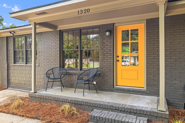 1320 Bresee St, Charleston, SC 29412 - entrance to property with covered porch and brick siding