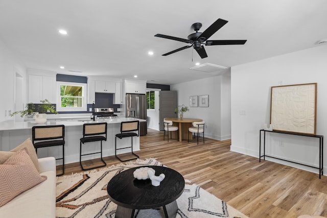 1320 Bresee St, Charleston, SC 29412 - living area with healthy amount of natural light, light wood-style flooring, recessed lighting, and a ceiling fan