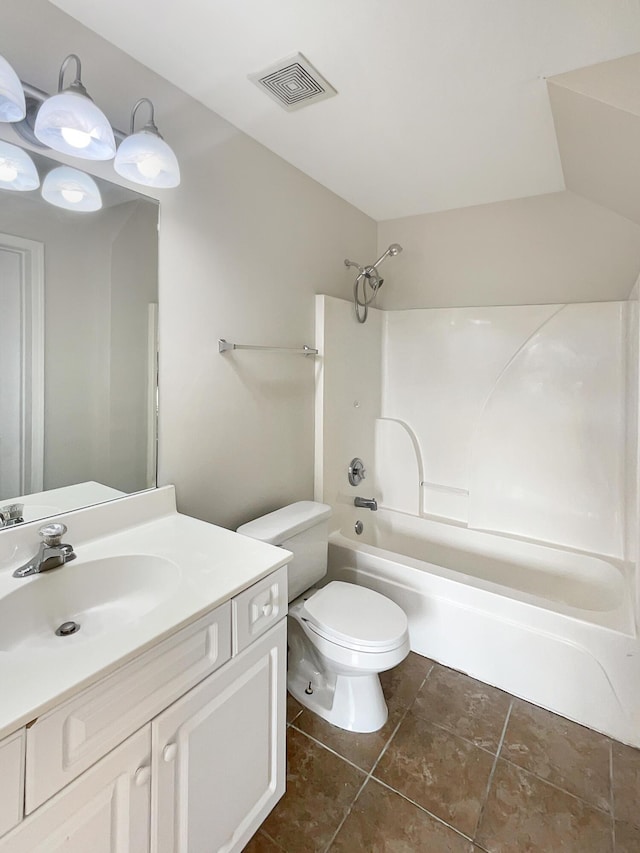 full bathroom with shower / bath combination, vanity, tile patterned flooring, and toilet