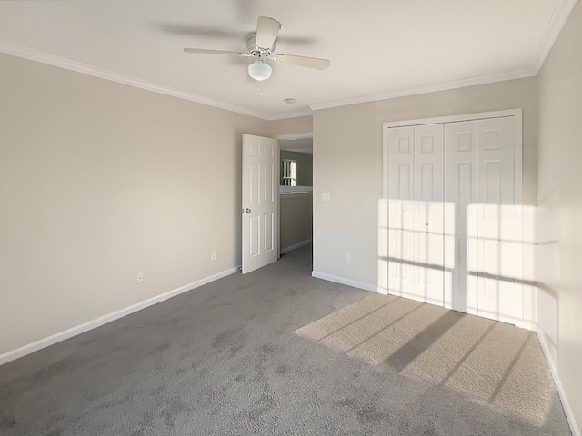 unfurnished bedroom with a closet, ceiling fan, carpet floors, and ornamental molding