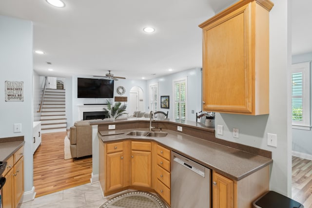 907 High Nest Ln, Charleston, SC 29412 - kitchen featuring dishwasher, ceiling fan, open floor plan, a fireplace, and dark countertops