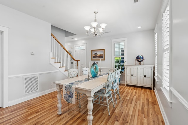 907 High Nest Ln, Charleston, SC 29412 - dining area featuring a chandelier, light wood-type flooring, stairs, and recessed lighting