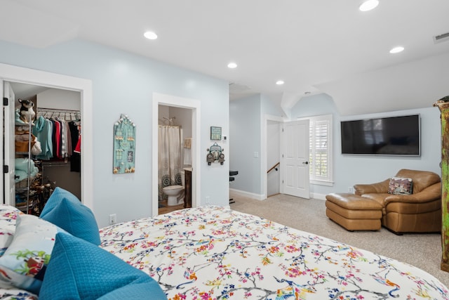 907 High Nest Ln, Charleston, SC 29412 - carpeted bedroom featuring vaulted ceiling, recessed lighting, a spacious closet, ensuite bath, and a closet