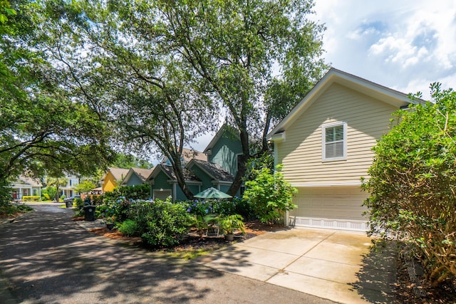 907 High Nest Ln, Charleston, SC 29412 - view of property exterior featuring a garage and driveway