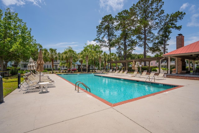 907 High Nest Ln, Charleston, SC 29412 - community pool featuring a patio area