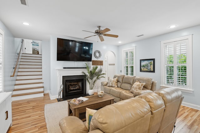 907 High Nest Ln, Charleston, SC 29412 - living area with a ceiling fan, light wood finished floors, stairs, recessed lighting, and a fireplace with flush hearth