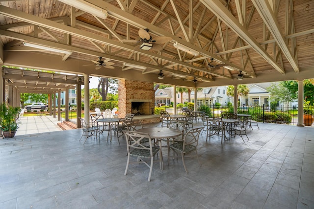 907 High Nest Ln, Charleston, SC 29412 - view of patio / terrace featuring an outdoor brick fireplace and a ceiling fan