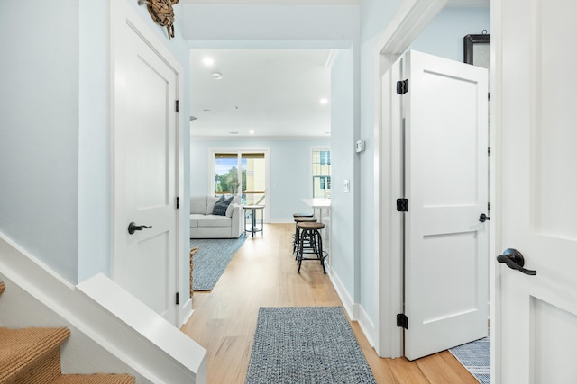 hallway featuring light hardwood / wood-style flooring