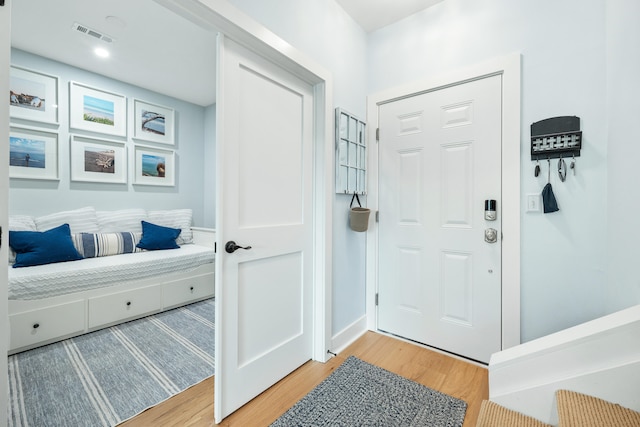 entrance foyer featuring hardwood / wood-style flooring