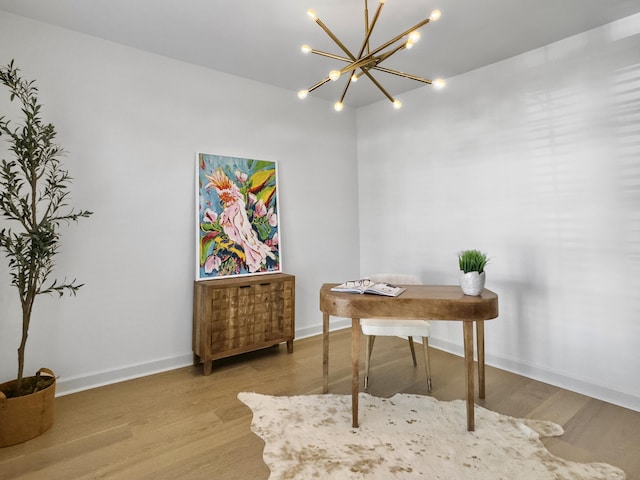 office space featuring wood finished floors and baseboards