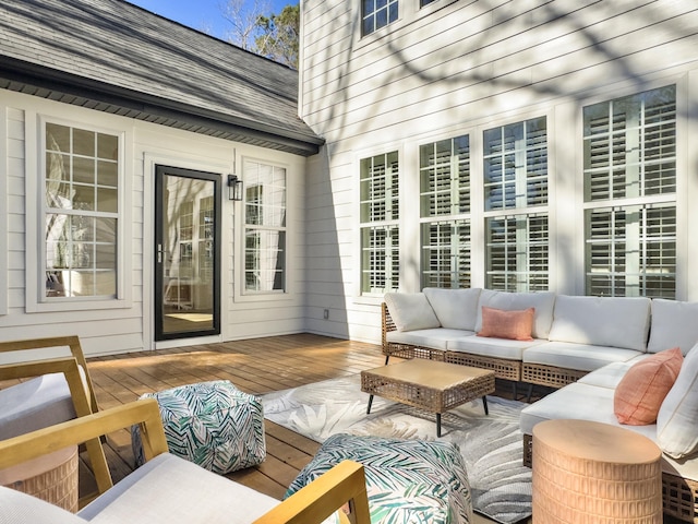 wooden terrace featuring outdoor lounge area