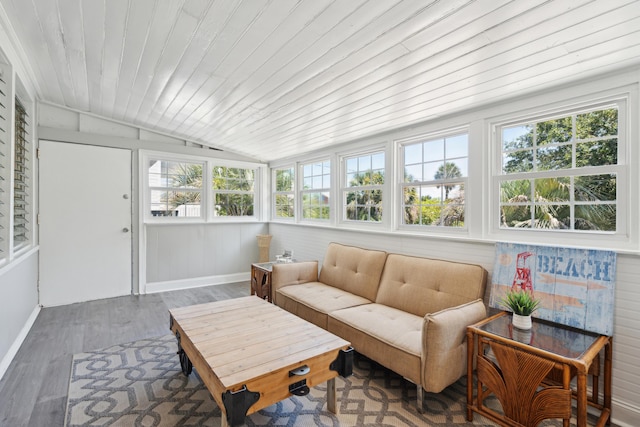 sunroom / solarium with plenty of natural light, wooden ceiling, and lofted ceiling