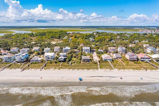 bird's eye view with a beach view and a water view