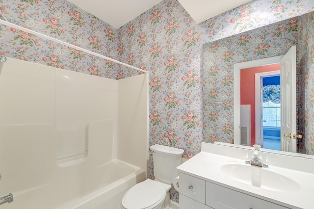 full bathroom featuring vanity, shower / bath combination, and toilet