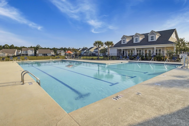 view of pool featuring a patio area