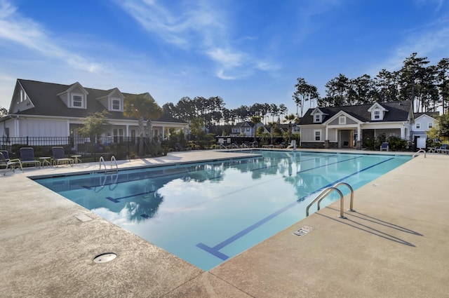 view of pool featuring a patio