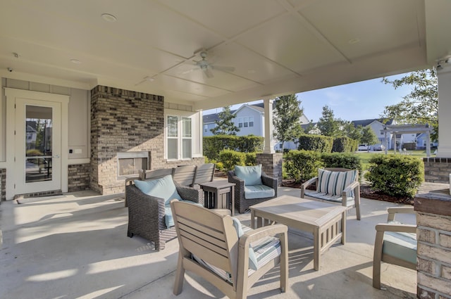 view of patio / terrace with an outdoor living space and ceiling fan