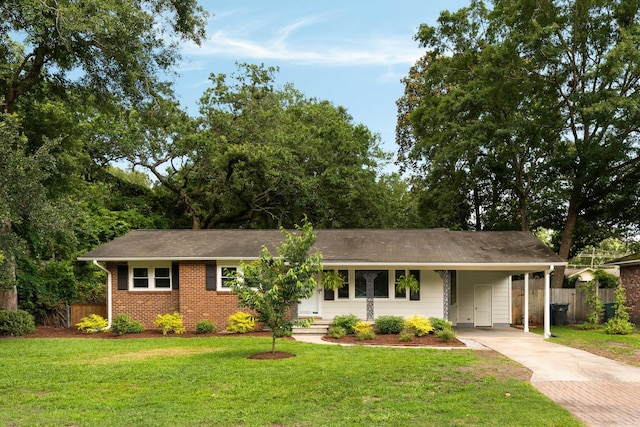1417 Downing St, Charleston, SC 29407 - ranch-style house with driveway, a carport, and brick siding